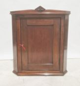 19th century mahogany wall-hanging corner cupboard, single door enclosing shelves, 89cm high