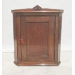 19th century mahogany wall-hanging corner cupboard, single door enclosing shelves, 89cm high