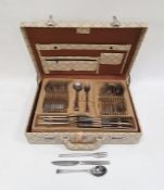 A stainless steel canteen of cutlery in Carl Weill fitted suitcase