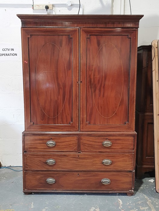 19th century converted mahogany linen press, the moulded cornice above two cupboard doors