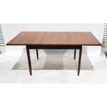 Mid century White & Newton teak extending dining table of rectangular form, on square section