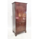 20th century mahogany single door wardrobe, the moulded cornice above single shelf, hanging space