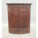 19th century wall hanging corner cupboard, two doors over one drawer