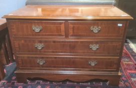 20th century mahogany blanket chest in from of a low chest of drawers