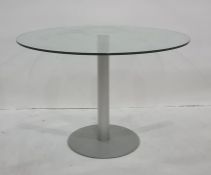 Circular glass-topped breakfast table, 109.5cm diameter on chrome pedestal and two modern circular