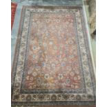 Modern peach ground rug, allover foliate decoration, cream ground border, 292cm x 200cm