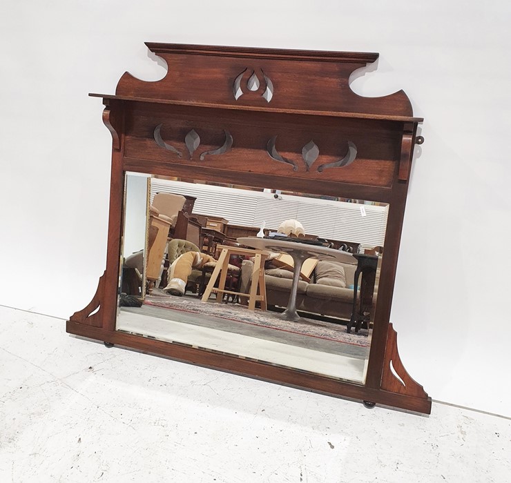 Late 19th/early 20th century mahogany overmantel mirror, the rectangular plate with bevel edge,
