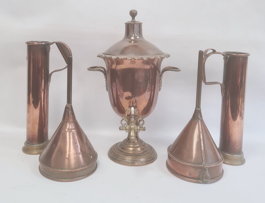 Brass copper urn-shaped samovar, two large copper funnels and two copper and brass specific