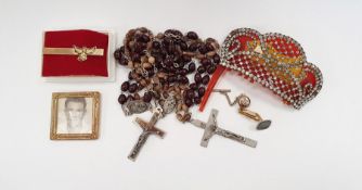 Quantity of British and foreign coinage, a set of rosary beads, a diamante hair comb (damaged)