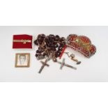 Quantity of British and foreign coinage, a set of rosary beads, a diamante hair comb (damaged)