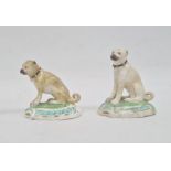 Two various early 19th century Staffordshire china miniature seated pug dogs, the largest 6.5cm high