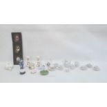 Assorted collection of miniature porcelain figures and models, including models of swans, birds