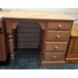 20th century pine dressing table, the rectangular top above four drawers, on plinth base to the