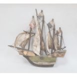 Painted and carved wooden naval model of a quadruple masted sailing galleon, 31cm high x 34cm wide
