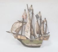 Painted and carved wooden naval model of a quadruple masted sailing galleon, 31cm high x 34cm wide