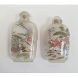 Two Chinese internally painted glass snuff bottles and stoppers, 8cm and 7cm high and a carved