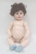German bisque headed doll with blue sleeping eyes, composition body, hairline cracked