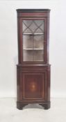 19th century mahogany corner display unit, satinwood banded with astragal glazed door above cupboard