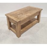 Modern pine two-tier coffee table, the rectangular top with cleated end supports, chunky square