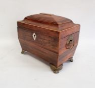 Georgian mahogany tea caddy, sarcophagus-shaped, pair brass floral basket and ring handles, fitted