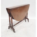Early 20th century walnut gateleg table on twin end pedestal turned supports to castors Condition