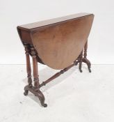 Early 20th century walnut gateleg table on twin end pedestal turned supports to castors Condition