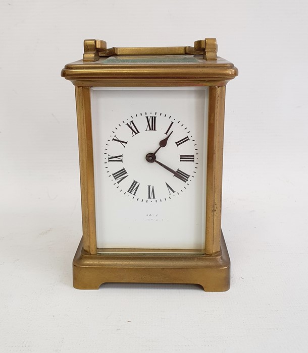 Brass carriage timepiece in plain case, 15cm high