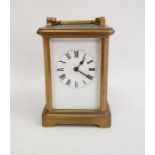 Brass carriage timepiece in plain case, 15cm high