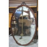 19th century oval wall mirror, bevelled edge, mahogany frame, 106cm x 64cm
