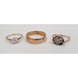 9ct gold wedding band, a 9ct gold solitaire ring set with a white stone and another 9ct gold ring,