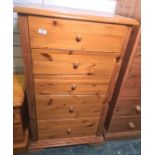 20th century narrow pine chest of five drawers, on ogee bracket feet, 64cm x 109.5cm Condition