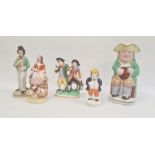 Collection of Staffordshire pottery figures, circa 1880, including a Toby jug, 24cm high overall,