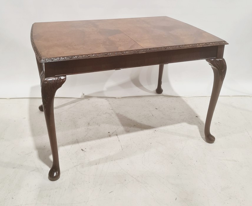 Reproduction walnut rectangular dining table with moulded and carved edge, cabriole legs, 114cm x