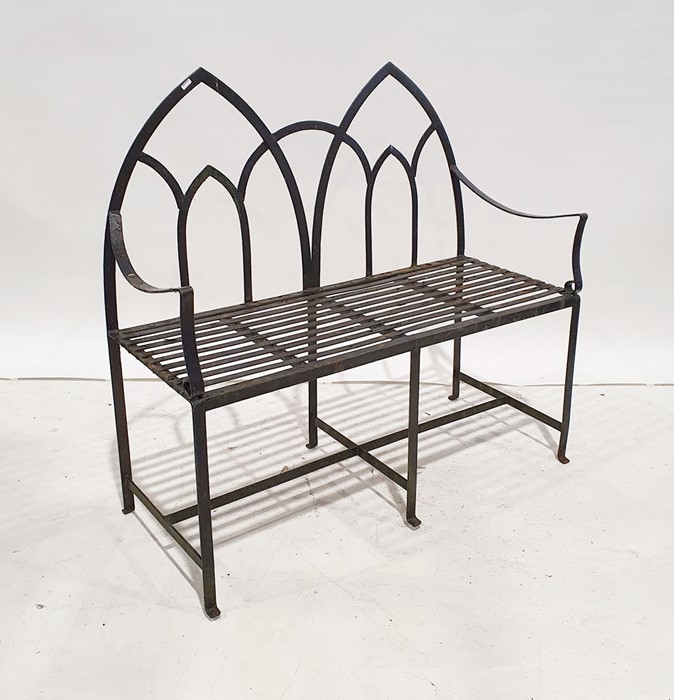 Iron strapwork two-seat bench with twin arch back Condition ReportLength 106.5cm Width (including