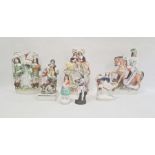 Six Staffordshire pottery figures and a continental porcelain figure, mid to late 19th century,