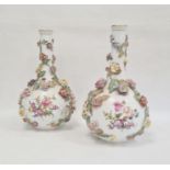 Pair of Dresden bottle vases, circa 1900, printed AR Dresden marks, painted with scenes of lovers in