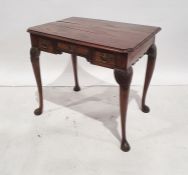 Circa 1700 elm lowboy, the plain top with fretted apron to the sides, three drawers to the front,