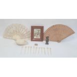 Bone cocktail sticks, Eastern carved stone figure, wooden brise fan, lace and bone fan and a