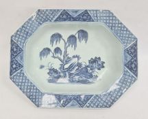 Chinese porcelain shallow dish, oblong with canted corners, willow and lotus design in blue and with