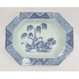 Chinese porcelain shallow dish, oblong with canted corners, willow and lotus design in blue and with