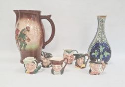 Royal Doulton large “Raleigh on Plymouth Ho” jug, moulded and painted with figures in Tudor dress