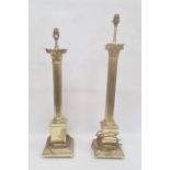 Pair brass Corinthian column table lamps, each on square base, each 63cm high to the top of the