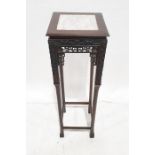 Oriental plant stand, the square top with white themed marble inset to the hardwood frame, carved