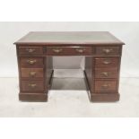 20th century mahogany pedestal desk with green leather inset top, nine assorted drawers, on plinth