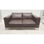 Modern two seater brown leather sofa with brushed steel base