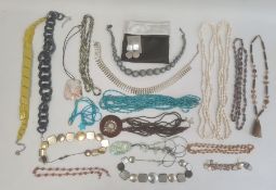 Large quantity of costume jewellery including a silver and yellow brooch, a statement bead
