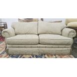 Two-seater sofa and single swivel chair in pale gold upholstery (2)  Condition ReportThe approximate