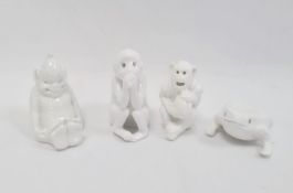 Four Bernard Moore (1850-1935) white glazed models of animals, including two monkeys, a frog and a
