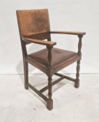20th century oak framed leather-seated and backed armchair turned and block supports, stretchered