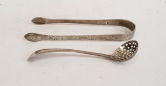 George III silver sugar nips, spoon end and bright cut engraved, possibly George Smith II and a
